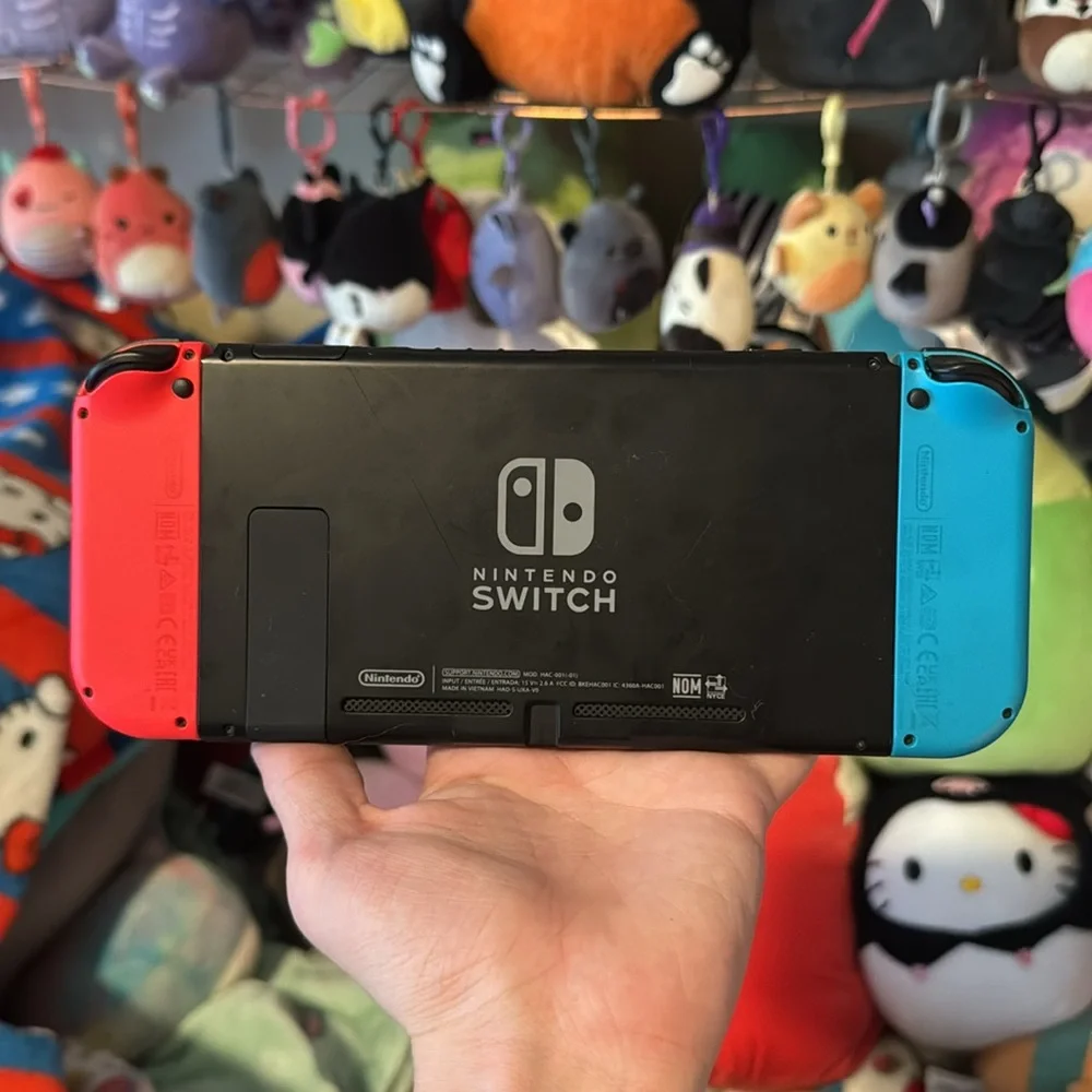 Nintendo switch handheld gaming system like brand new barley ever used